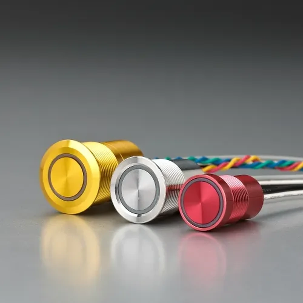 ONPOW yellow, white, and red metal push buttons with cable leads