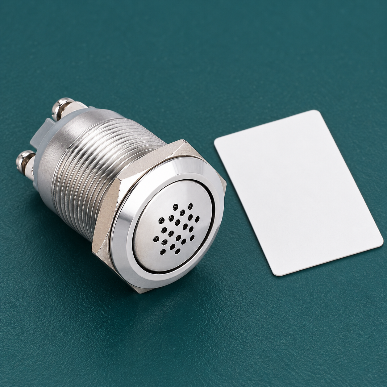 Exact GQ16B-M metal buzzer with a flat perforated face, threaded body and two original rear screw terminals, disconnected