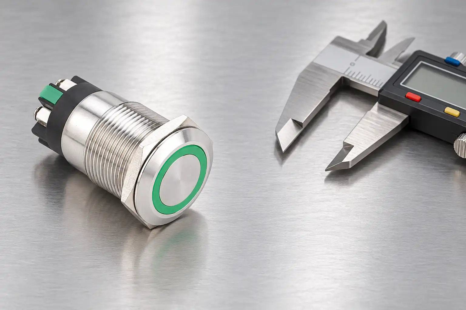 Intact mechanical button beside a disconnected caliper